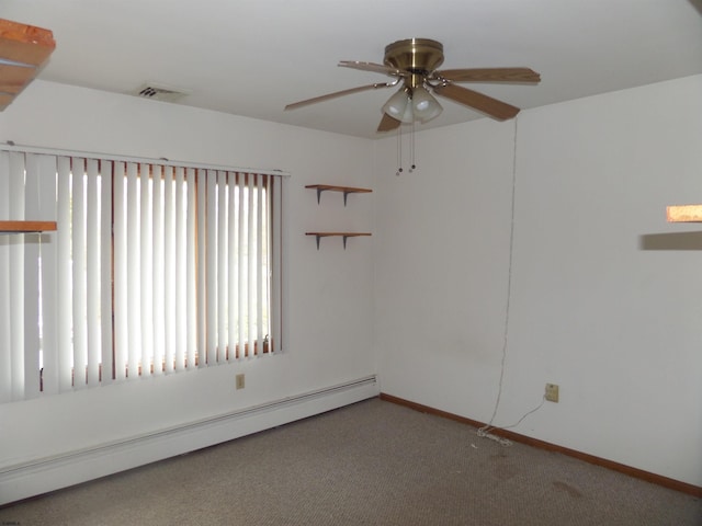 78 Tyler Rd, Greenfield, NJ 08230 - unfurnished room with visible vents, a ceiling fan, a baseboard heating unit, carpet, and baseboards