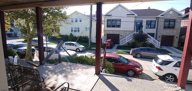 exterior space with a residential view and stairs