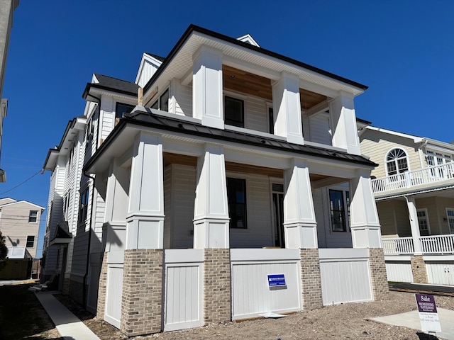 view of home's exterior featuring a standing seam roof