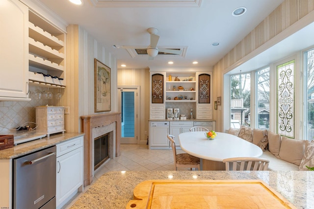 kitchen featuring open shelves, stainless steel dishwasher, white cabinets, and recessed lighting