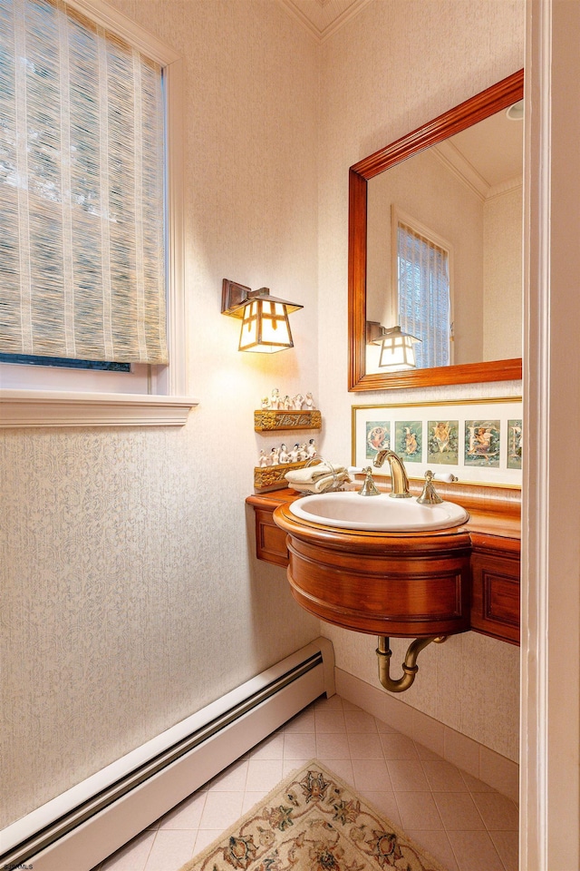 bathroom with tile patterned floors, crown molding, and a baseboard radiator