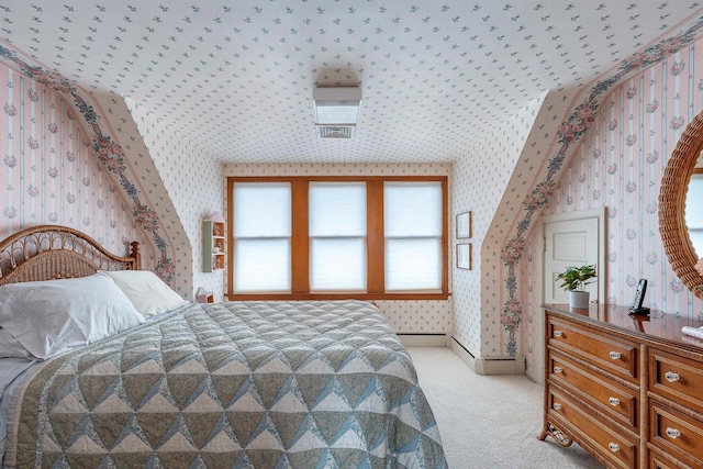 bedroom featuring light colored carpet and wallpapered walls