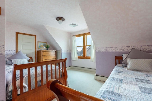 carpeted bedroom with visible vents, baseboards, vaulted ceiling, and a baseboard radiator