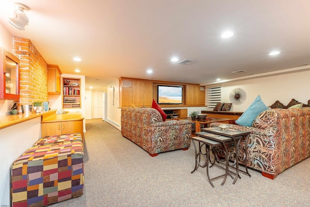 living area with recessed lighting, a baseboard radiator, visible vents, and carpet flooring