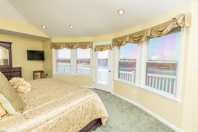 carpeted bedroom with recessed lighting, baseboards, lofted ceiling, and access to outside