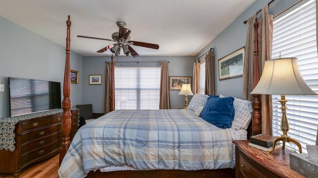 bedroom featuring wood finished floors and ceiling fan