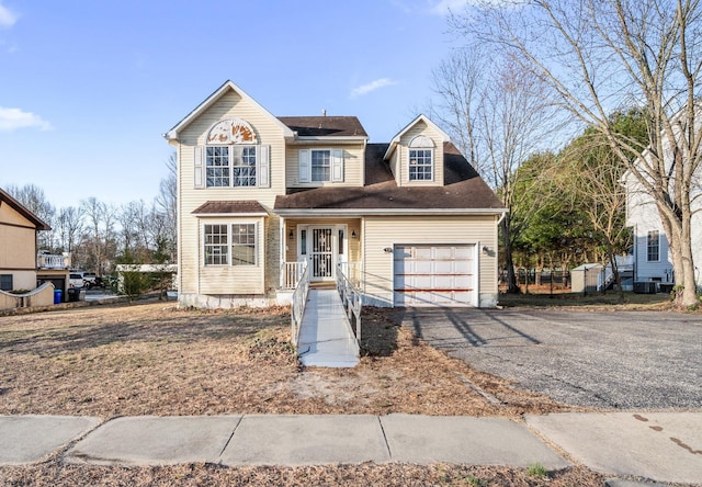 view of front of house featuring a garage and driveway