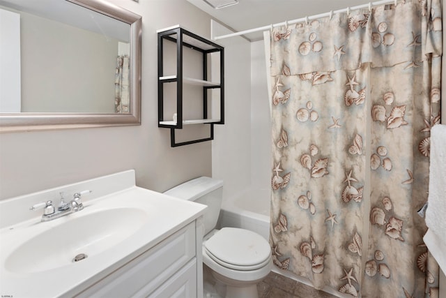 full bathroom featuring vanity, toilet, and shower / bath combo with shower curtain