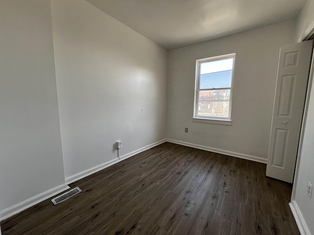 11 Belle Haven Ct, Atlantic City, NJ 08401 - unfurnished bedroom with visible vents, baseboards, and dark wood finished floors