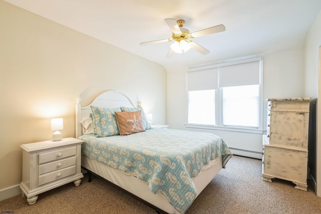 carpeted bedroom with a baseboard heating unit, baseboards, and ceiling fan