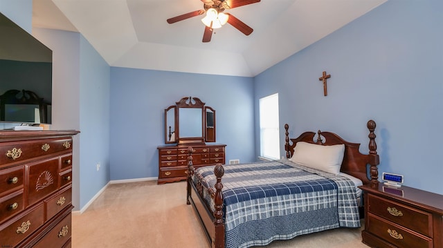 bedroom with light colored carpet, baseboards, and ceiling fan