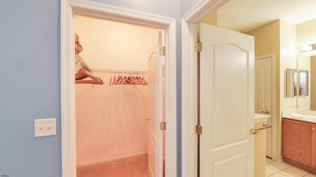 bathroom featuring tile patterned floors and vanity