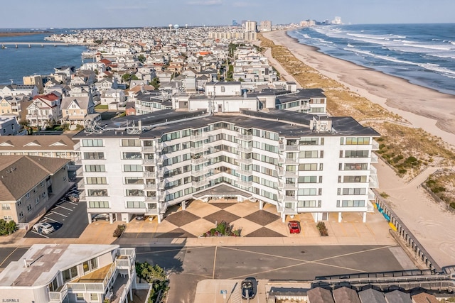 aerial view featuring a beach view and a water view