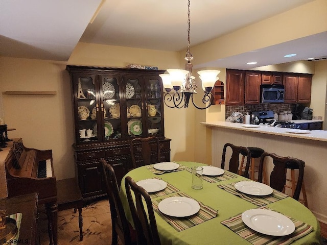 dining room with an inviting chandelier