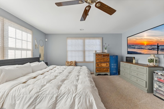 bedroom featuring ceiling fan and carpet flooring