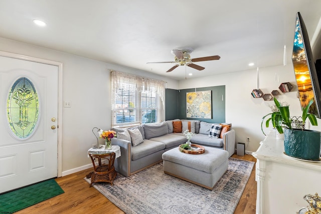 living room with recessed lighting, wood finished floors, baseboards, and ceiling fan