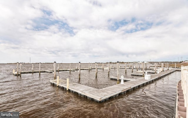 dock area featuring a water view