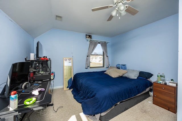 bedroom with visible vents, lofted ceiling, carpet, and a ceiling fan