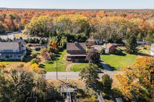 drone / aerial view with a view of trees