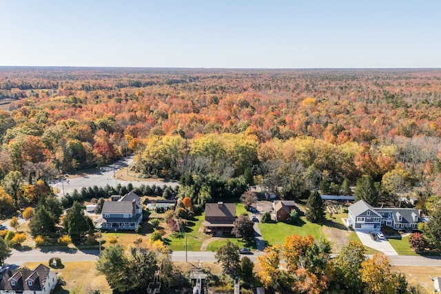 aerial view featuring a view of trees