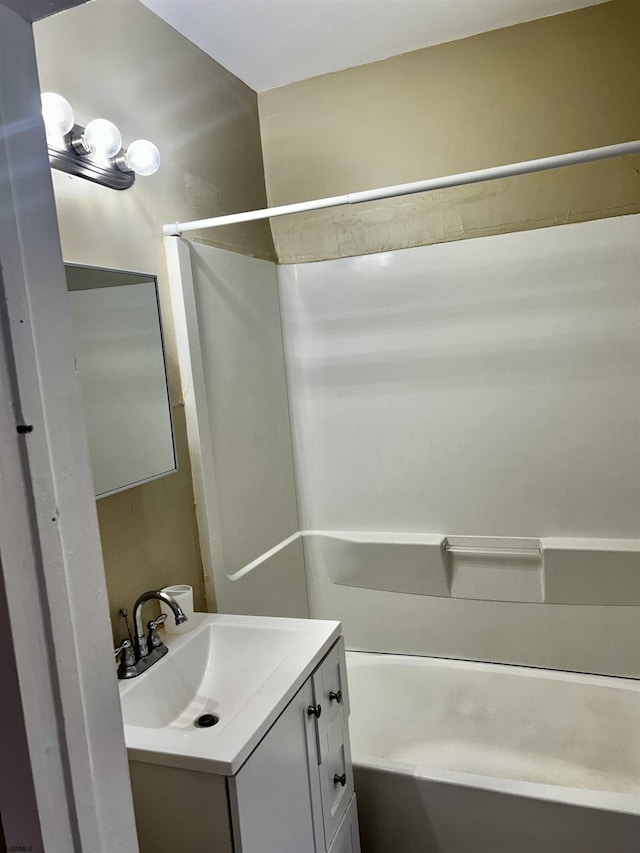 full bathroom with vanity and shower / tub combination