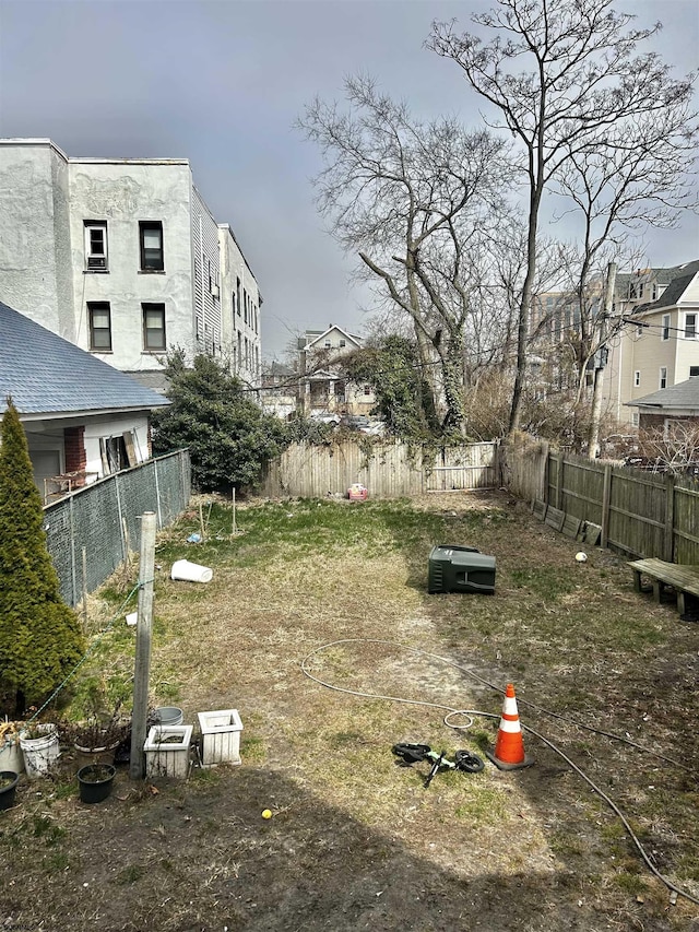 view of yard with fence