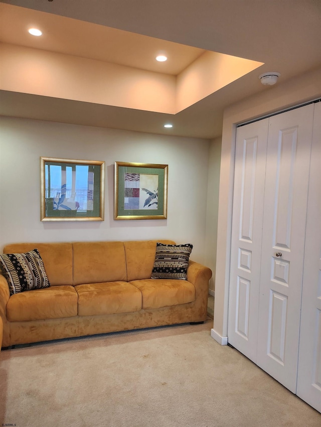 carpeted living room with recessed lighting