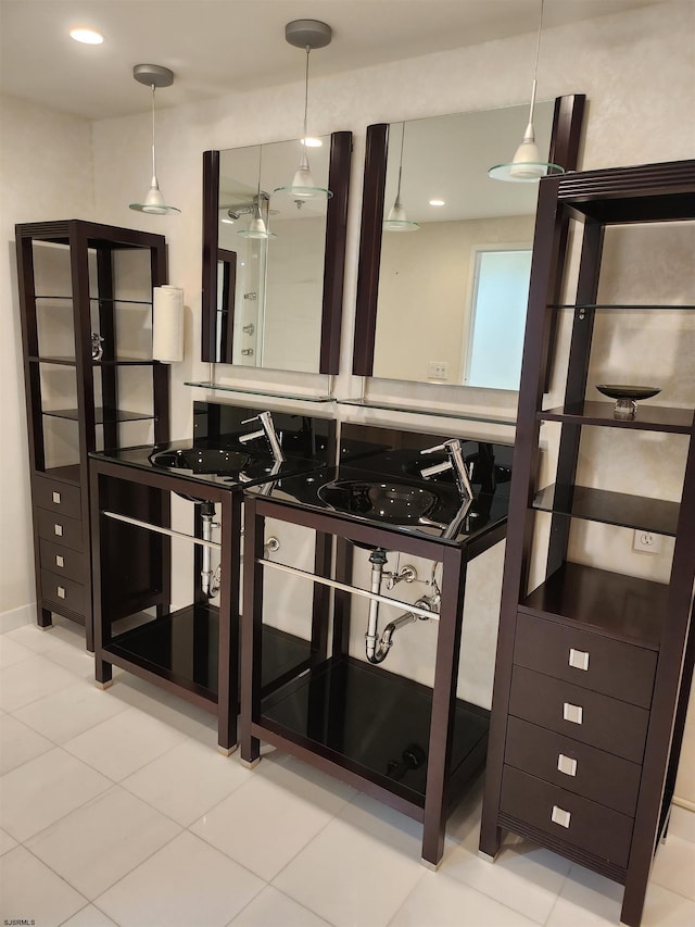 bathroom featuring recessed lighting and vanity