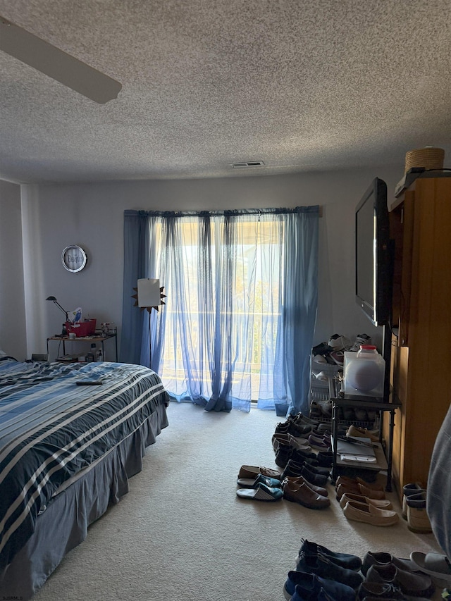 602 N Dorset Ave, Ventnor, NJ 08406 - bedroom featuring a textured ceiling, visible vents, carpet flooring, and access to outside
