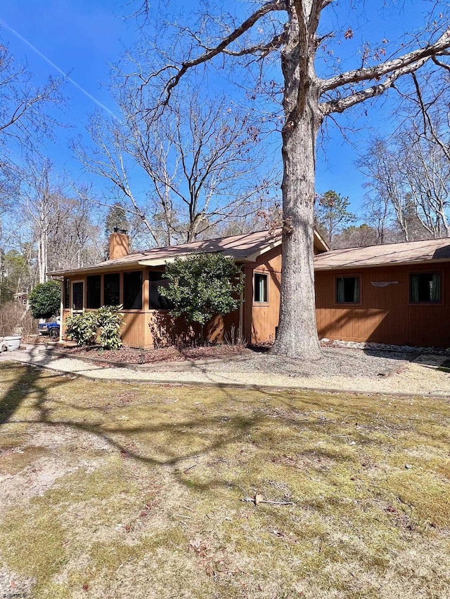 view of front of property with a chimney