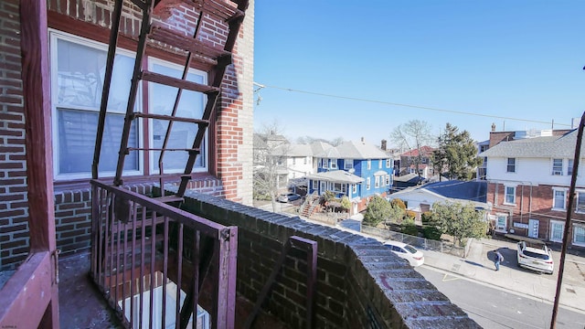 balcony featuring a residential view