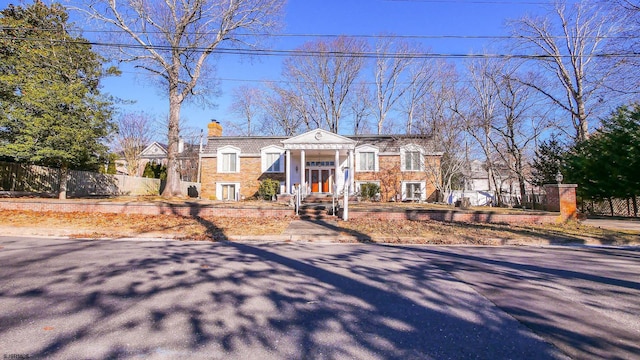 102 Morris Ave, Linwood, NJ 08221 - front of property featuring brick siding, a chimney, and fence