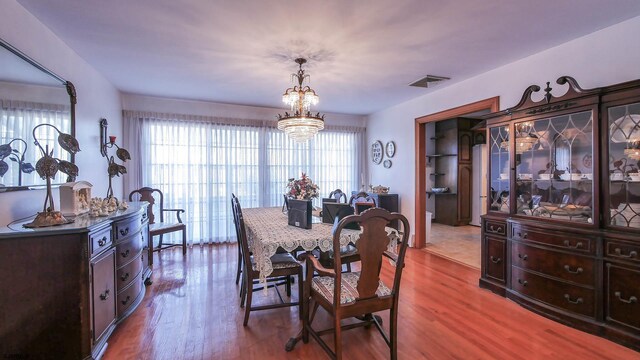 102 Morris Ave, Linwood, NJ 08221 - dining area with visible vents, wood finished floors, and a chandelier