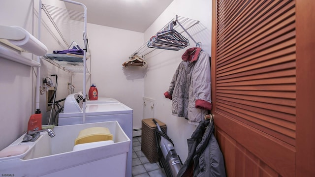 102 Morris Ave, Linwood, NJ 08221 - laundry room featuring tile patterned floors, a sink, washing machine and dryer, baseboard heating, and laundry area