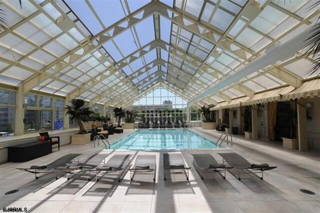 526 Pacific Ave Unit 2407, Atlantic City, NJ 08401 - indoor pool featuring a patio area