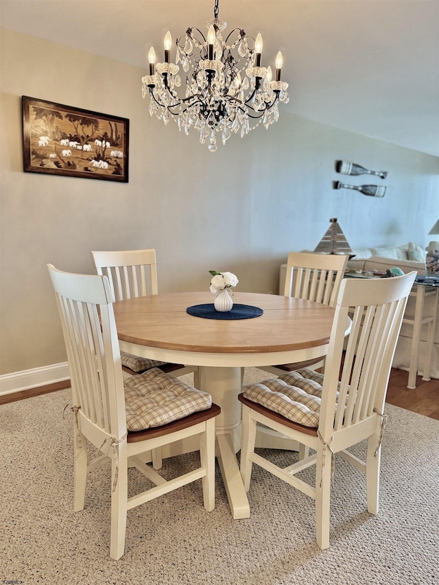 336 Bay Ave Unit 605, Ocean City, NJ 08226 - dining area featuring baseboards and an inviting chandelier