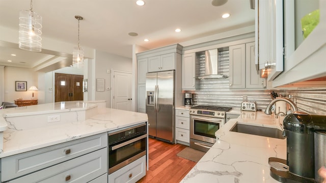1905 Glenwood Dr, Ocean City, NJ 08226 - kitchen featuring gray cabinetry, stainless steel appliances, wall chimney range hood, and a sink