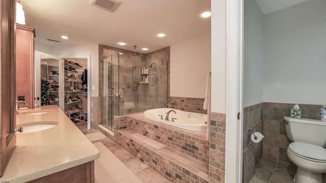 1905 Glenwood Dr, Ocean City, NJ 08226 - bathroom featuring recessed lighting, toilet, a bath, visible vents, and a stall shower