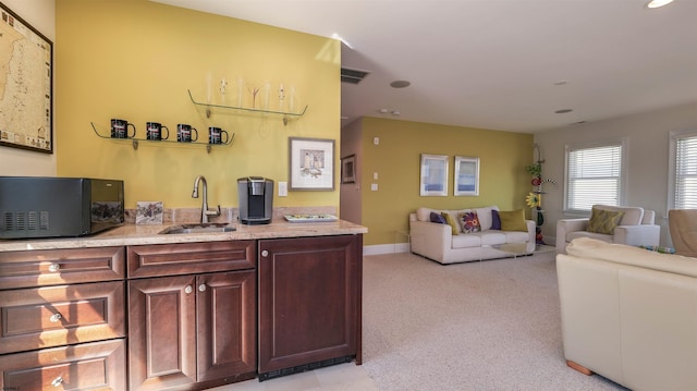 1905 Glenwood Dr, Ocean City, NJ 08226 - living area featuring baseboards, visible vents, and light colored carpet