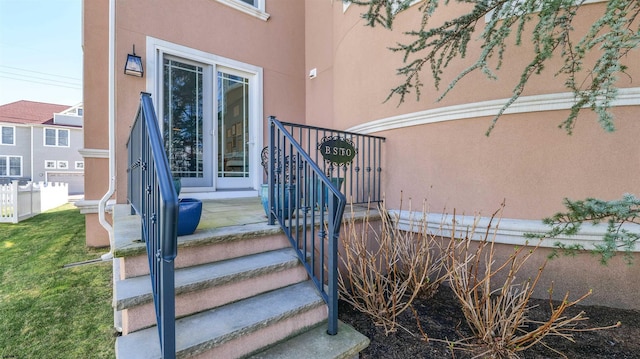 1905 Glenwood Dr, Ocean City, NJ 08226 - doorway to property with fence and stucco siding