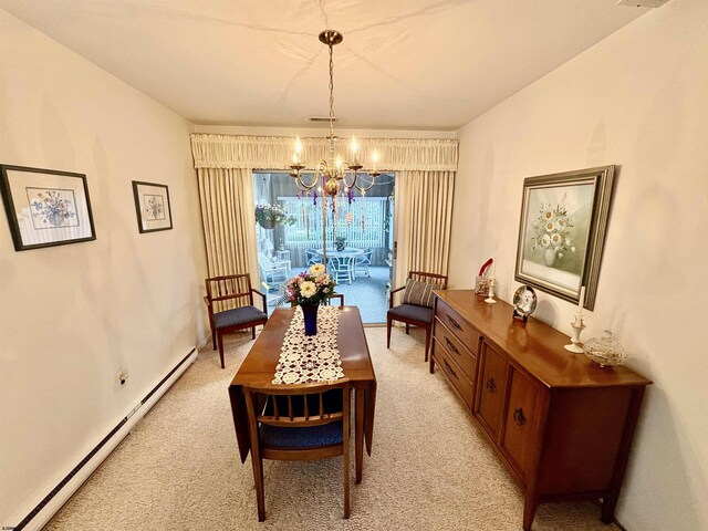 dining room with visible vents, a chandelier, baseboards, baseboard heating, and light carpet