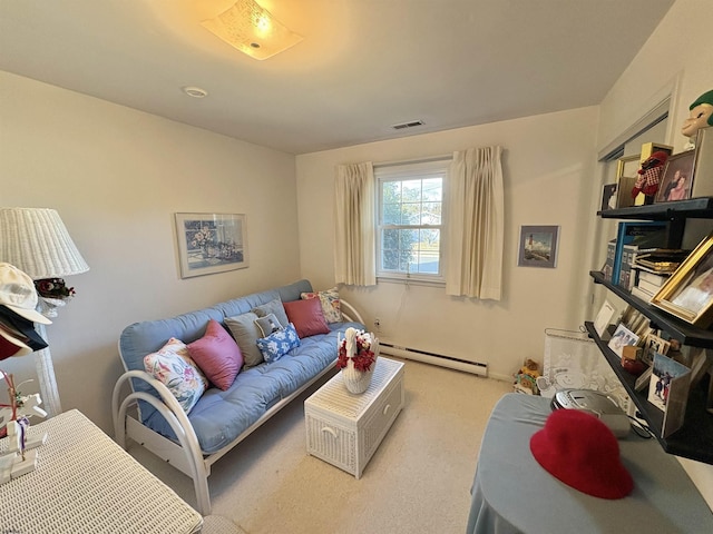 carpeted living area with baseboard heating and visible vents