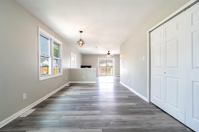 28 W Thompson Ave, Pleasantville, NJ 08232 - unfurnished dining area with baseboards, visible vents, wood finished floors, and a ceiling fan