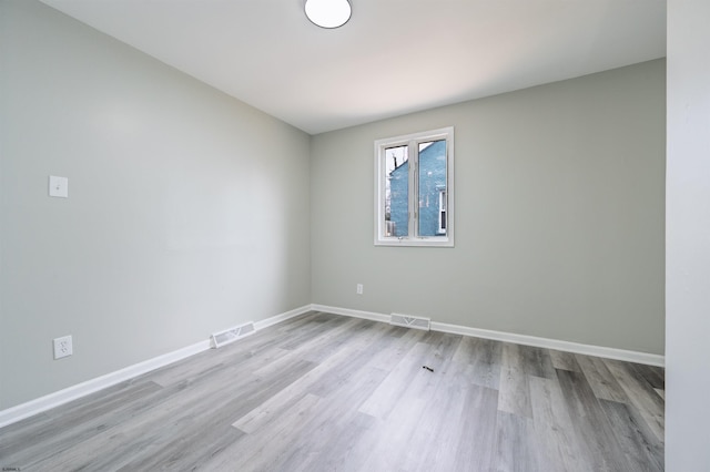 28 W Thompson Ave, Pleasantville, NJ 08232 - unfurnished room featuring baseboards, visible vents, and wood finished floors