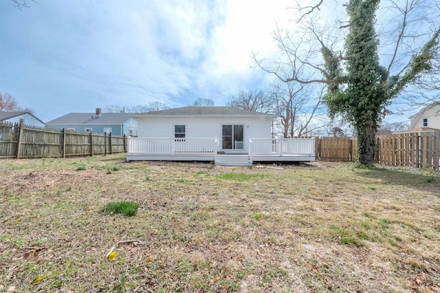 28 W Thompson Ave, Pleasantville, NJ 08232 - back of property with a fenced backyard, a wooden deck, and a yard
