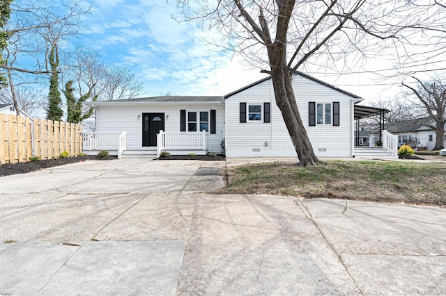 28 W Thompson Ave, Pleasantville, NJ 08232 - view of front of home with concrete driveway, crawl space, fence, and a porch