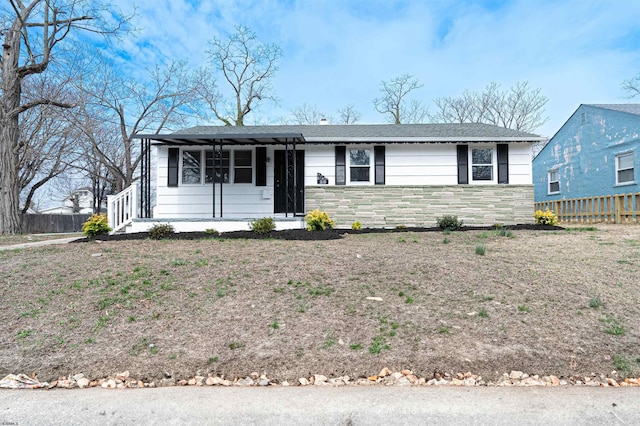 28 W Thompson Ave, Pleasantville, NJ 08232 - ranch-style home featuring fence, covered porch, and stone siding