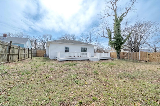 28 W Thompson Ave, Pleasantville, NJ 08232 - back of house featuring a gate, a fenced backyard, a deck, and a yard