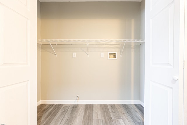 28 W Thompson Ave, Pleasantville, NJ 08232 - washroom featuring washer hookup, baseboards, light wood-style flooring, and laundry area