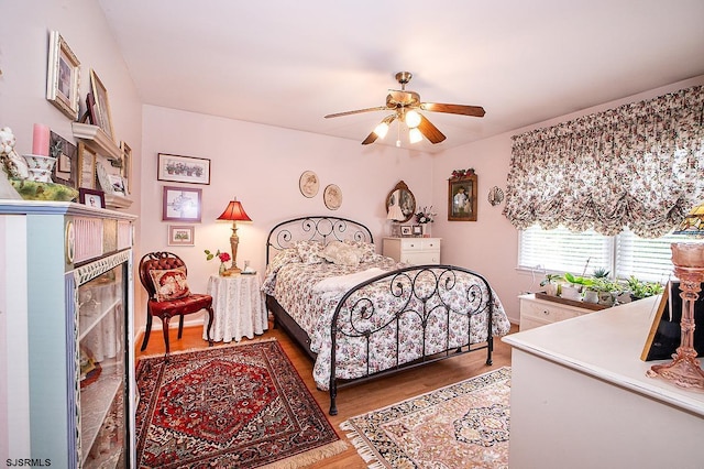 9 Saddle Rdg, Egg Harbor Township, NJ 08234 - bedroom with a fireplace, wood finished floors, and a ceiling fan